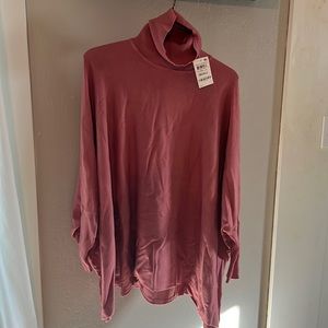 Women’s poncho sweater